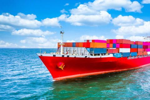 Container cargo ship, Freight shipping maritime vessel, Global business import export commerce trade logistic and transportation oversea worldwide by container cargo ship boat in the open sea.